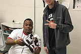 custom sneaker artist, Jeremy Bolding (pictured on right)