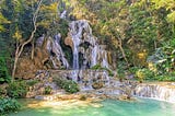 Limestone-Like Natural Pools And A Spectacular Cascade