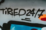 Picture with the words — Tired 24/7