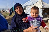 Grandmother and baby at Bardarash refugee camp, Iraq (December 2019)
