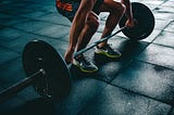 Guy lifting a barbell