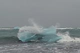 Waves breaking over an iceberg.
