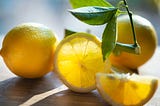 Lemons on a table, in the sunshine