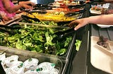 A salad bar with fresh and local hydroponic lettuce
