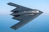 B-2 bomber in flight, it is shaped a little like a Dorito chip.