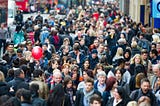 Very crowded street with a large amount of people