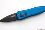 Order Kershaw Launch 4 Auto Knife with automatic red bulls-eye firing button and black galvanized aluminum handle