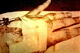 IV tube running into a vein, taped up to the hand