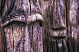 Wooden faces. Photo by AStoKo on Pixabay