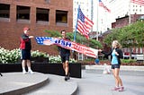 Croix Sather crossing the finish line of a 2,621 mile run across America