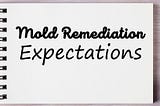 Mold remediation expectation written on a notebook