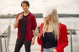 A man and women vaping