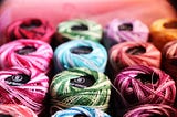 Spools of multi-colored thread