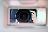 Shallow focus photography of camera lens
