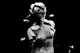 Fragmenting statue