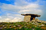 Photograph of a megalithic site in Ireland known as the Poulnabrone Dolmen