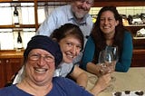 a picture with me, my mom, dad and sister at a winery