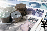 A close-up of Japanese coins and notes.