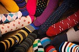 A circle of multi-colored, multi-patterned socks