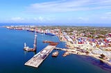 Free Ports: Costs and Benefits
