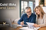Image of two customers of U.S. Money Reserve reviewing gold IRA tax documents.