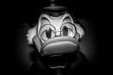 Scrooge McDuck in monochrome.