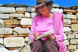 The author, Carolyn V. Hamilton, journaling in Aphrodisias, Turkey.
