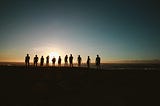 Photo by Belle Co: https://www.pexels.com/photo/silhouette-of-people-during-sunset-1000444/
