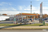 A picture from Google Maps of Kruse Automotive as it appears today from the main road. There is a much larger Shell gas station with the repair shop behind.