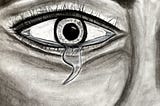 Charcoal drawing by Author. Drawing is intended to highlight the suicide prevention symbolic semi-colon. The semi-colon represents the continuation of one’s story/life rather than the finality of a period. The drawing is of an eye is in shades of black and white. The eye is wide, pupil dilated as the top of the semicolon, with a tear drop beneath shaped as the bottom of the semicolon.