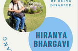 This is a poster about the piece with a photo of Hiranya, who is dressed in white top and jeans, sitting on a wheelchair in a garden with flowers in the backdrop, and looking at the camera, with her name diagonally below that. The name of the piece — The loneliness of being disabled is written at the top right corner. On the left bottom is the word Dislang written in stylized formatting.