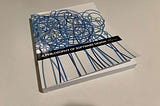 A physical copy of A Philosophy of Software Design by John Ousterhout, sitting on a desk