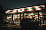 Image of a convenience store at night