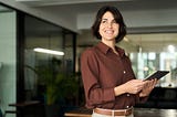 woman in office smiling