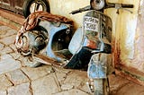 Photo of derelict motorcycle.