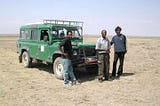 L-R: Jerry, Thomas, and Ashwin. On the Serengeti, or Siringet — unending plains. Photo: N. Pradeep Kumar, 2004.