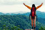 traveler with backpack adventure feeling victorious