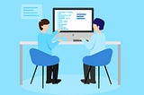 Animated picture of two developers sharing a computer
