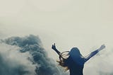Woman with arms spread open in freedom | Image from Unsplash | Mohamed Nohassi @coopery