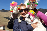 Playing with baby goats in Tibet