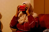 A participant uses a Viewmaster