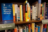 Style and grammar books on a shelf in a bookstore