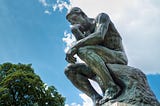 “Rodin’s ‘The Thinker’ in the Rodin Museum in Paris.” by Mustang Joe. Picture taken from https://www.flickr.com/photos/mustangjoe/5966894496