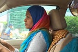 After years, a female taxi driver goes behind the wheel