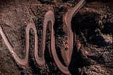 A winding road with three large switchbacks, representing three big changes