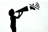 Silhouette of a person shouting into a megaphone with a mute icon exiting the far side