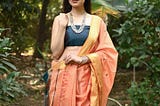 The Enchanting Embrace of Handloom Maheshwari Sarees: A Tapestry of Tradition