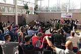 People raising their hands in prayer