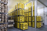 Why Your Business Needs Roll Cage Pallets for Material Handling