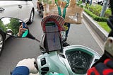 A Grabbike driver driving in Ho Chi Minh City